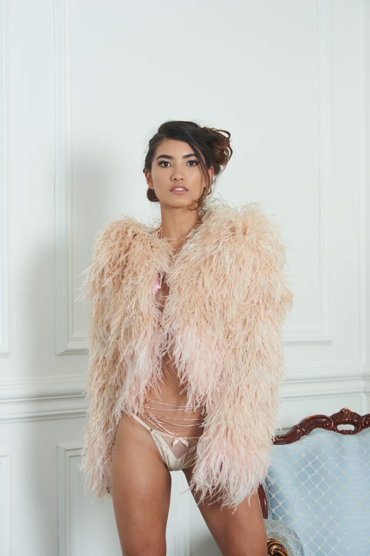 Blush ostrich feather coat with rose-gold chains